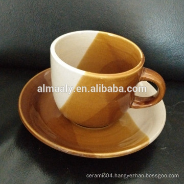 stoneware color glazed cup and saucer